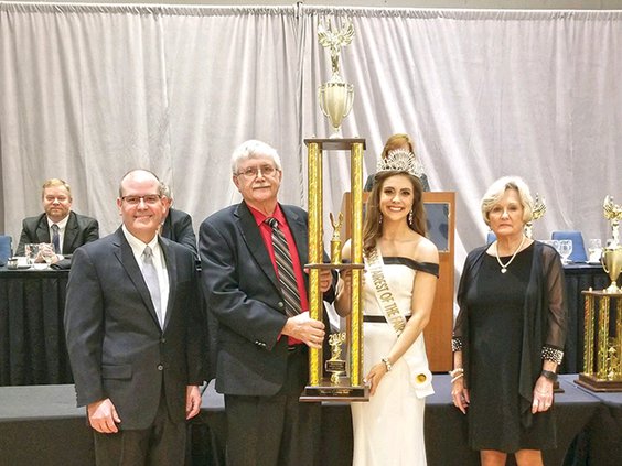 1 Fair - trophy with unhappy lady on right.jpg